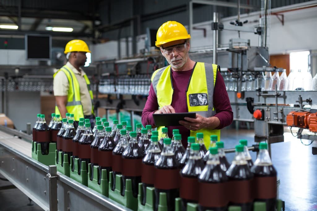 Beverage industry professionals in warehouse